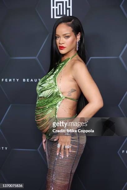 Rihanna poses for a picture as she celebrates her beauty brands fenty beauty and fenty skin at Goya Studios on February 11, 2022 in Los Angeles,...