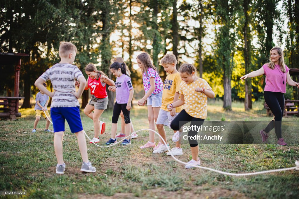 Jump Rope Students School Children Jumping Rope In A Summer Camp High-Res Stock Photo ...