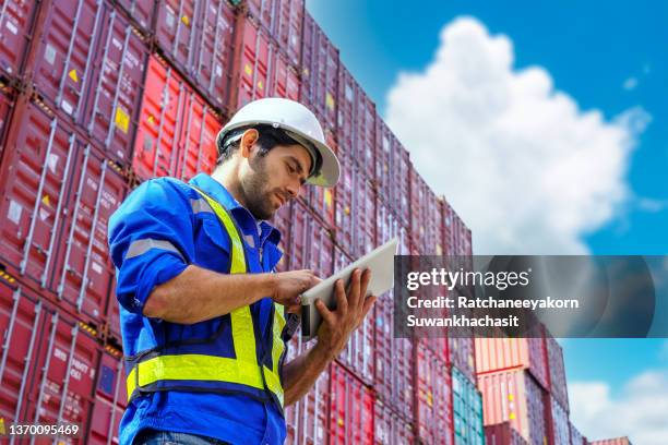 foreman control industrial container cargo freight ship. - computer loading stock pictures, royalty-free photos & images
