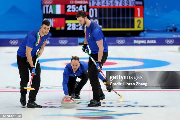 Sebastiano Arman, Joel Retornaz and Amos Mosaner of Team Italy compete against Team China during the Men's Round Robin Curling Session on Day 8 of...