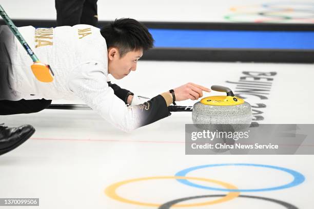 Xiuyue Ma of Team China competes against Team Italy during the Men's Round Robin Curling Session on Day 8 of the Beijing 2022 Winter Olympic Games at...