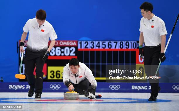 Zhiyu Wang, Xiuyue Ma and Jingtao Xu of Team China compete against Team Italy during the Men's Round Robin Curling Session on Day 8 of the Beijing...