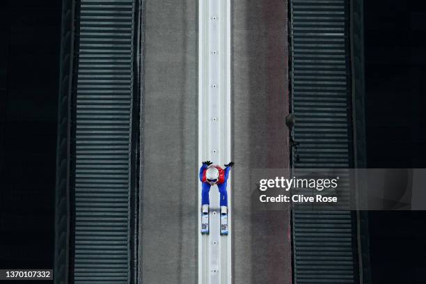 Mackenzie Boyd-Clowes of Team Canada competes during the Men's Large Hill Individual Trial Round for Competition on Day 8 of Beijing 2022 Winter...