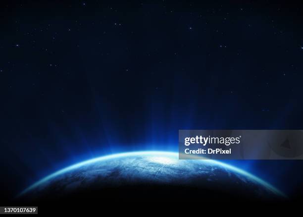 glowing planet earth and dark space with stars - earth horizon stock pictures, royalty-free photos & images