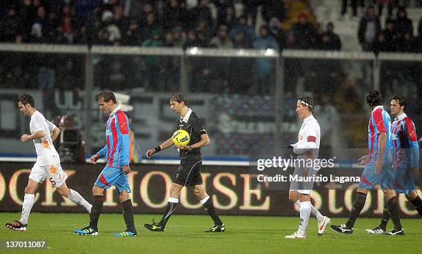 The referee Paolo Tagliavento suspends the match during the Serie A match between Catania Calcio v AS Roma at Stadio Angelo Massimino on January 14,...