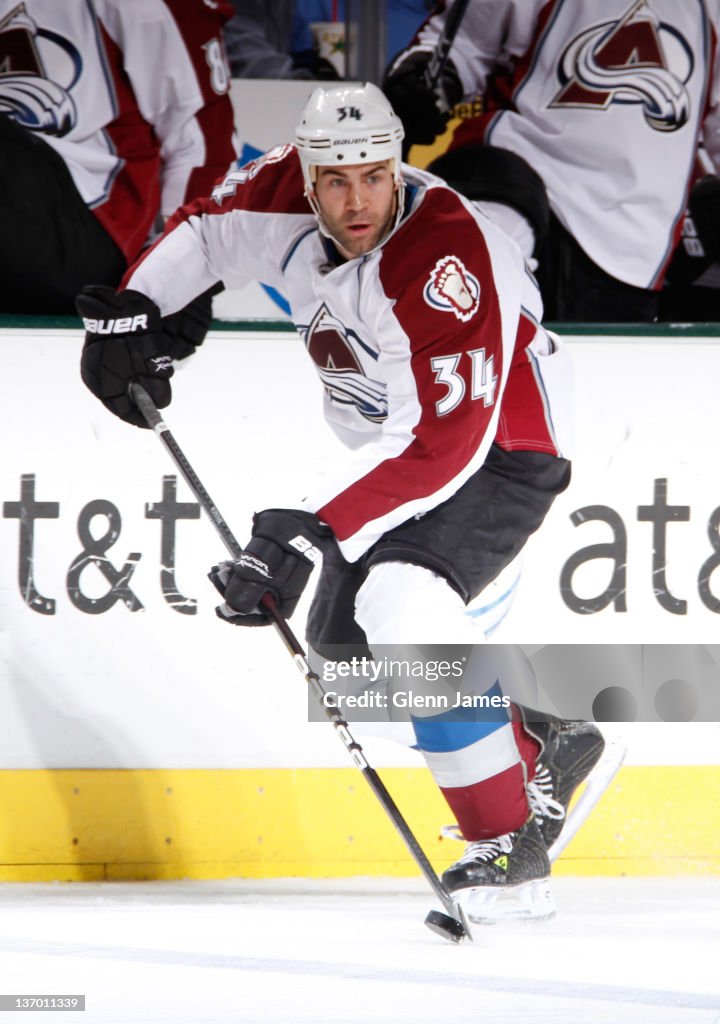 Daniel Winnik Of The Colorado Avalanche Handles The Puck Against The daniel-winnik-of-the-colorado-avalanche-handles-the-puck-against-the