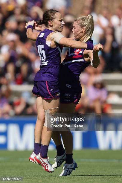 Kara Antonio and Hayley Miller of the Dockers celebrate a goal during the round six AFLW match between the Fremantle Dockers and the Carlton Blues at...