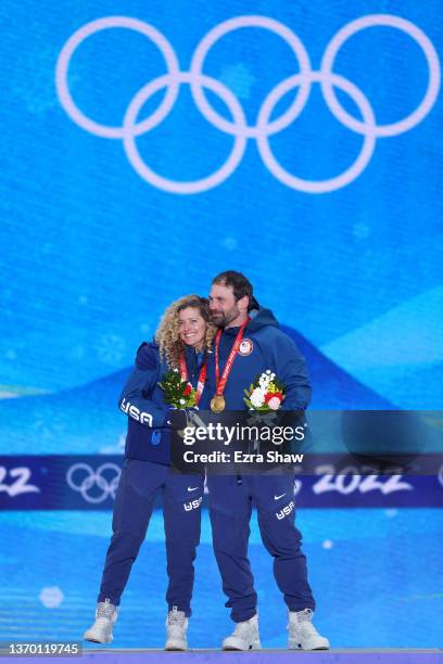 Gold medallists Lindsey Jacobellis and Nick Baumgartner of Team United States pose with their medals during the Mixed Team Snowboard Cross medal...