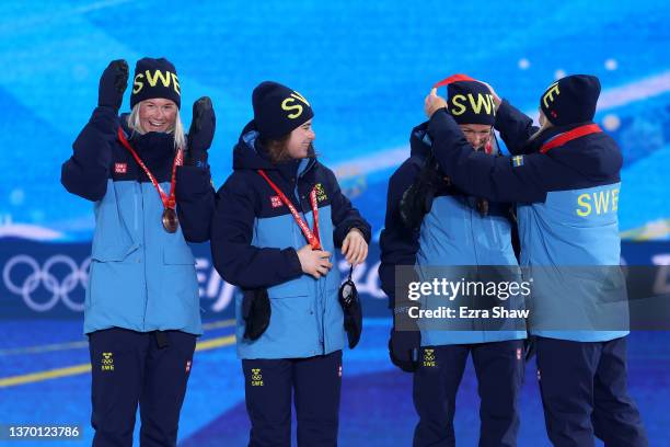 Bronze medallists Maja Dahlqvist, Ebba Andersson, Frida Karlsson and Jonna Sundling of Team Sweden pose with their medals during the Women's...