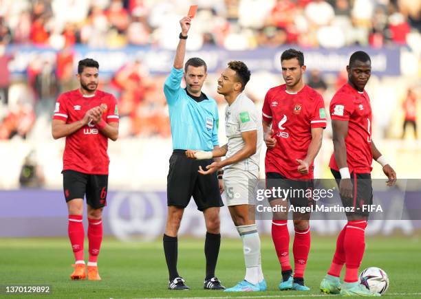 Matheus Pereira of Al Hilal is shown a red card by Referee Clement Turpin during the FIFA Club World Cup UAE 2021 3rd Place Match between Al-Hilal v...