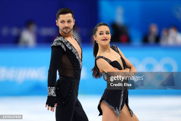 Lilah Fear and Lewis Gibson of Team Great Britain skate during the Ice Dance Rhythm Dance on day eight of the Beijing 2022 Winter Olympic Games at...