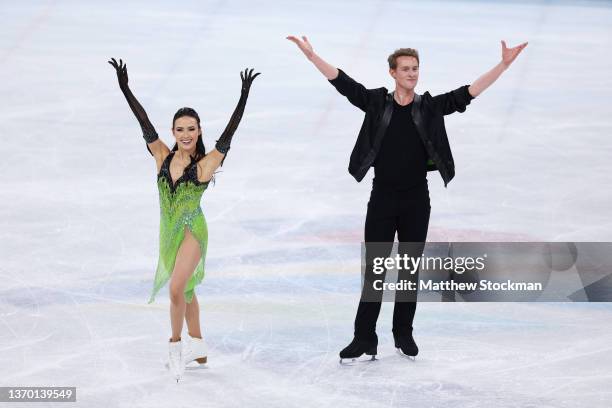 Madison Chock and Evan Bates of Team United States react after skating during the Ice Dance Rhythm Dance on day eight of the Beijing 2022 Winter...