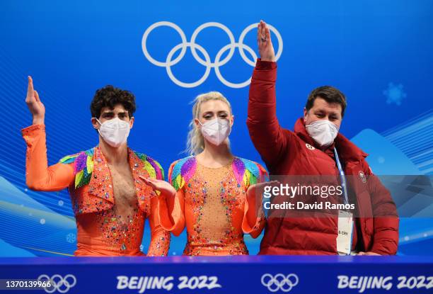 Piper Gilles and Paul Poirier of Team Canada wait for their score during the Ice Dance Rhythm Dance on day eight of the Beijing 2022 Winter Olympic...