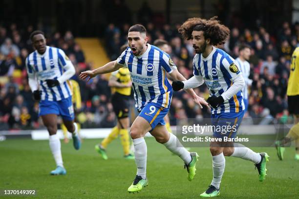 Neal Maupay celebrates with Marc Cucurella of Brighton & Hove Albion after scoring their team's first goal during the Premier League match between...
