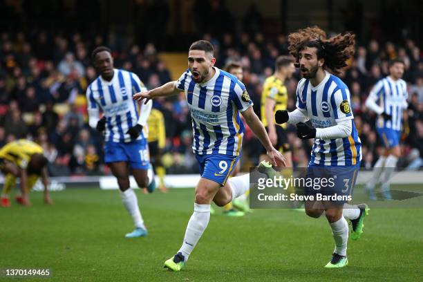 Neal Maupay celebrates with Marc Cucurella of Brighton & Hove Albion after scoring their team's first goal during the Premier League match between...