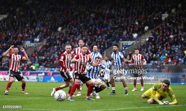 Billy Sharp of Sheffield United reacts after Lee Nicholls of Huddersfield Town made a save during the Sky Bet Championship match between Huddersfield...