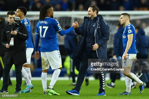 Frank Lampard, Manager of Everton and Alex Iwobi of Everton celebrate following their side's victory in the Premier League match between Everton and...