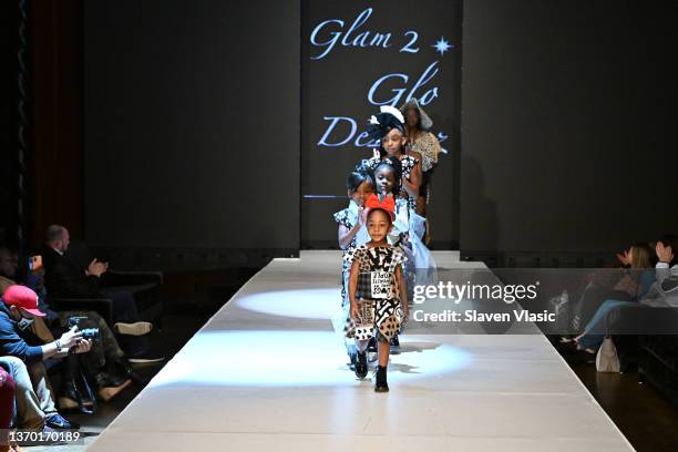 Models walk the runway wearing Glam2Glo Designz during the NYFW hiTechMODA Season 7 Réversion #noapology show at The Edison Ballroom on February 12...