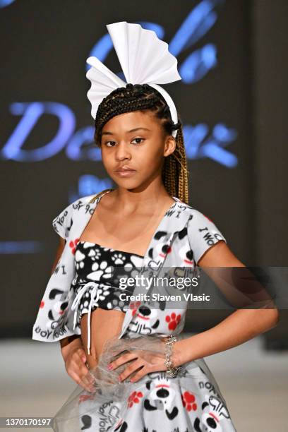 Model walks the runway wearing Glam2Glo Designz during the NYFW hiTechMODA Season 7 Réversion #noapology show at The Edison Ballroom on February 12...