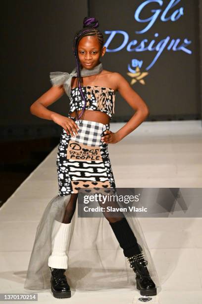 Model walks the runway wearing Glam2Glo Designz during the NYFW hiTechMODA Season 7 Réversion #noapology show at The Edison Ballroom on February 12...