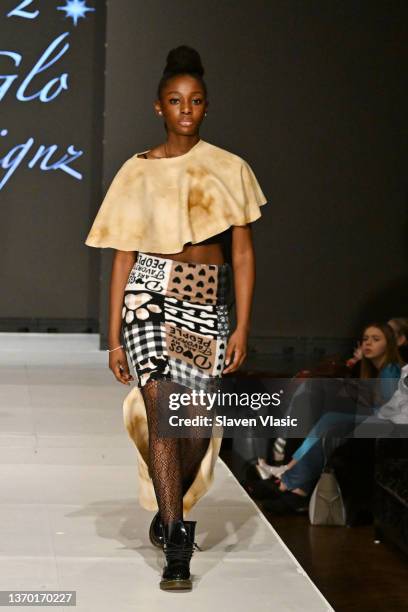 Model walks the runway wearing Glam2Glo Designz during the NYFW hiTechMODA Season 7 Réversion #noapology show at The Edison Ballroom on February 12...