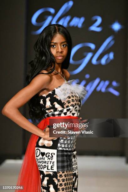 Model walks the runway wearing Glam2Glo Designz during the NYFW hiTechMODA Season 7 Réversion #noapology show at The Edison Ballroom on February 12...