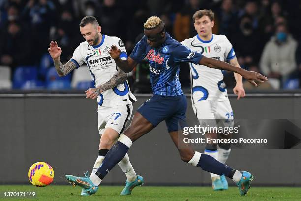 Victor Osimhen of SSC Napoli vies with Marcelo Brozovic of FC Internazionale during the Serie A match between SSC Napoli and FC Internazionale at...