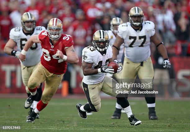 Darren Sproles of the New Orleans Saints runs with the ball against the San Francisco 49ers in the fourth quarter of the NFC Divisional playoff game...