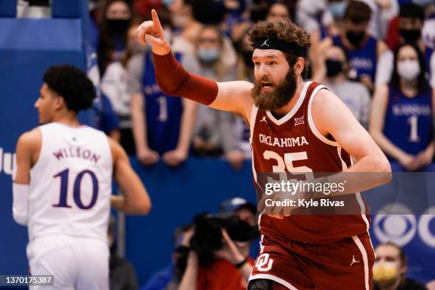 Tanner Groves of the Oklahoma Sooners celebrates making a shot against the Kansas Jayhawks during the first half at Allen Fieldhouse on February 12,...