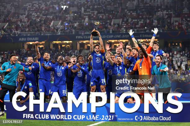 Cesar Azpilicueta of Chelsea lifts the FIFA Club World Cup trophy following victory in the FIFA Club World Cup UAE 2021 Final match between Chelsea...