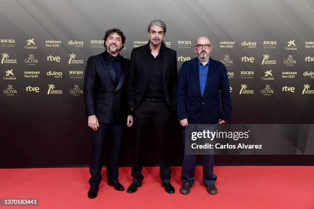 Javier Bardem, Fernando Leon de Aranoa and Jaume Roures attend Goya Cinema Awards 2022 red carpet at Palau de les Arts on February 12, 2022 in...