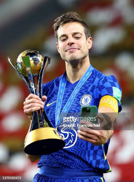 Cesar Azpilicueta of Chelsea celebrates with the FIFA Club World Cup trophy following victory in the FIFA Club World Cup UAE 2021 Final match between...