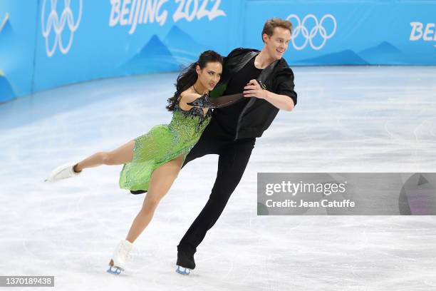 Madison Chock and Evan Bates of United States skate during the Ice Dance Rhythm Dance Figure Skating on day 8 of the Beijing 2022 Winter Olympic...