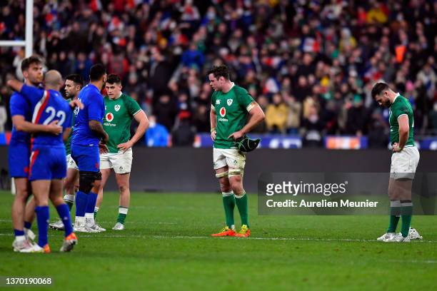 James Ryan and Robbie Henshaw of Ireland react after loosing the Guinness Six Nations match between France and Ireland at Stade de France on February...