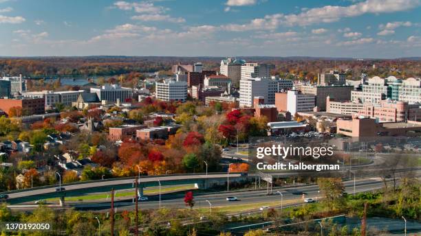 aerial shot of downtown trenton, new jersey with delaware river in distance - trenton new jersey stock pictures, royalty-free photos & images