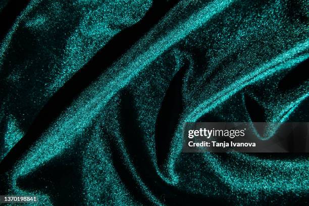 texture of velour fabric is emerald green. - beauty cosmetic luxury studio background stock pictures, royalty-free photos & images