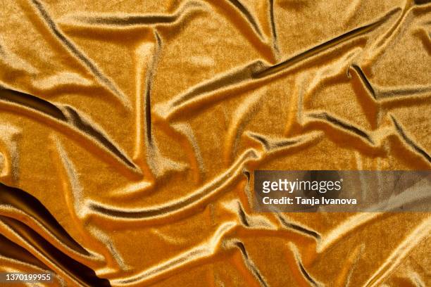 texture of velour fabric is orange. - velour foto e immagini stock