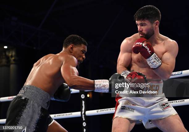 Daniel Jacobs punches John Ryder during the super-middleweight fight between Daniel Jacobs and John Ryder at Alexandra Palace on February 12, 2022 in...