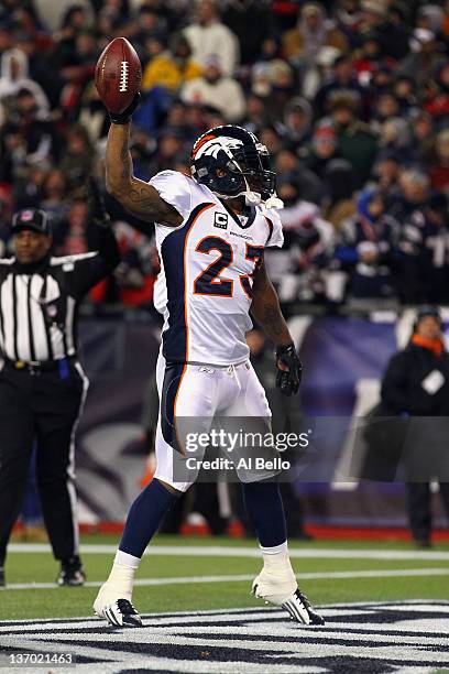 Willis McGahee of the Denver Broncos celebrates after he scored a 5-yard rushing touchdown in the second quarter against the New England Patriots...