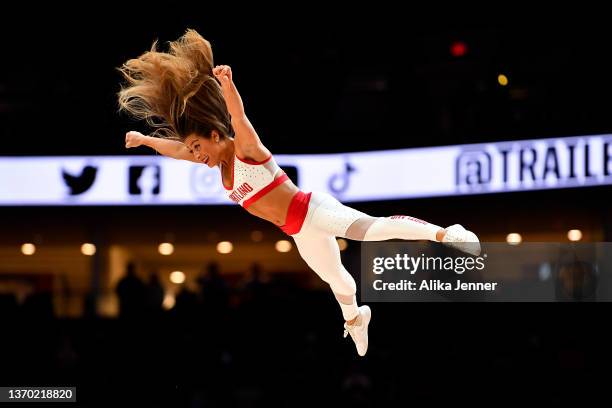 Member of the Portland Trail Blazers dance team goes airborne during a break in the game against the New York Knicks at the Moda Center on February...