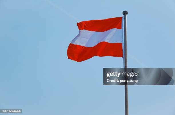 austrian flag - austria flag stock-fotos und bilder