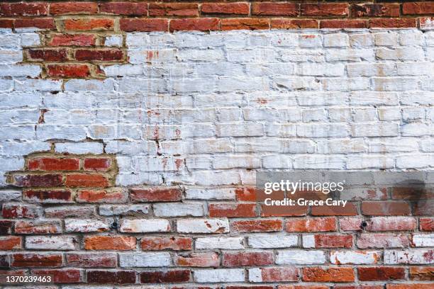 weathered brick wall - alexandria virginia stock pictures, royalty-free photos & images