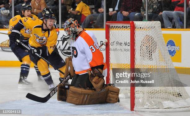 Nick Spaling of the Nashville Predators scores the game winner against Illya Bryzgalov of the Philadelphia Flyers during an NHL game at the...