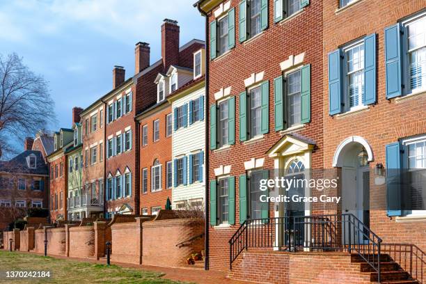 row of brick townhouses - old town alexandria virginia stock pictures, royalty-free photos & images