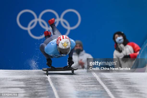 Katie Uhlaender of United States slides during the Women's Skeleton heat 3 on day eight of Beijing 2022 Winter Olympic Games at National Sliding...