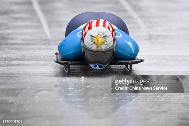Katie Uhlaender of United States slides during the Women's Skeleton heat 3 on day eight of Beijing 2022 Winter Olympic Games at National Sliding...
