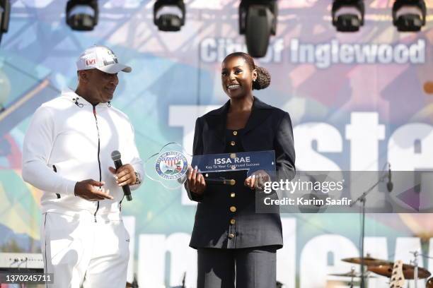 Inglewood Mayor James Butts presents Issa Rae with first ever City of Inglewood key to the city on stage during the Taste Of Inglewood Experience...