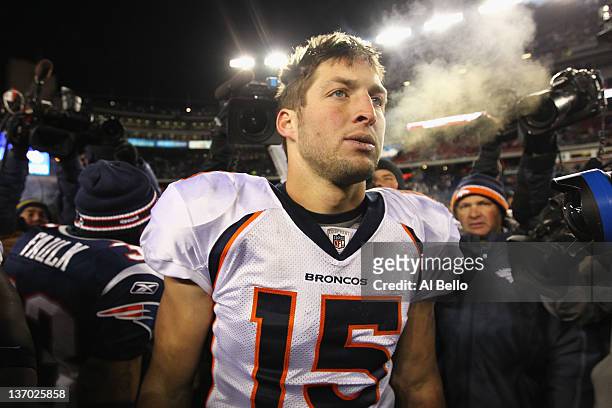 Tim Tebow of the Denver Broncos looks on after the Broncos lost 45-10 against the New England Patriots during their AFC Divisional Playoff Game at...