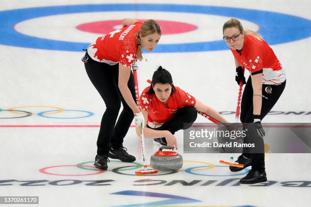 Melanie Barbezat, Esther Neuenschwander and Alina Paetz of Team Switzerland compete against Team Canada during the Women's Curling Round Robin...