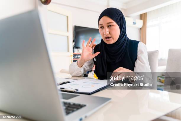 young business girl busy working on laptop at home in formal wear - concept of professional it employee during work from home - formal office stock pictures, royalty-free photos & images